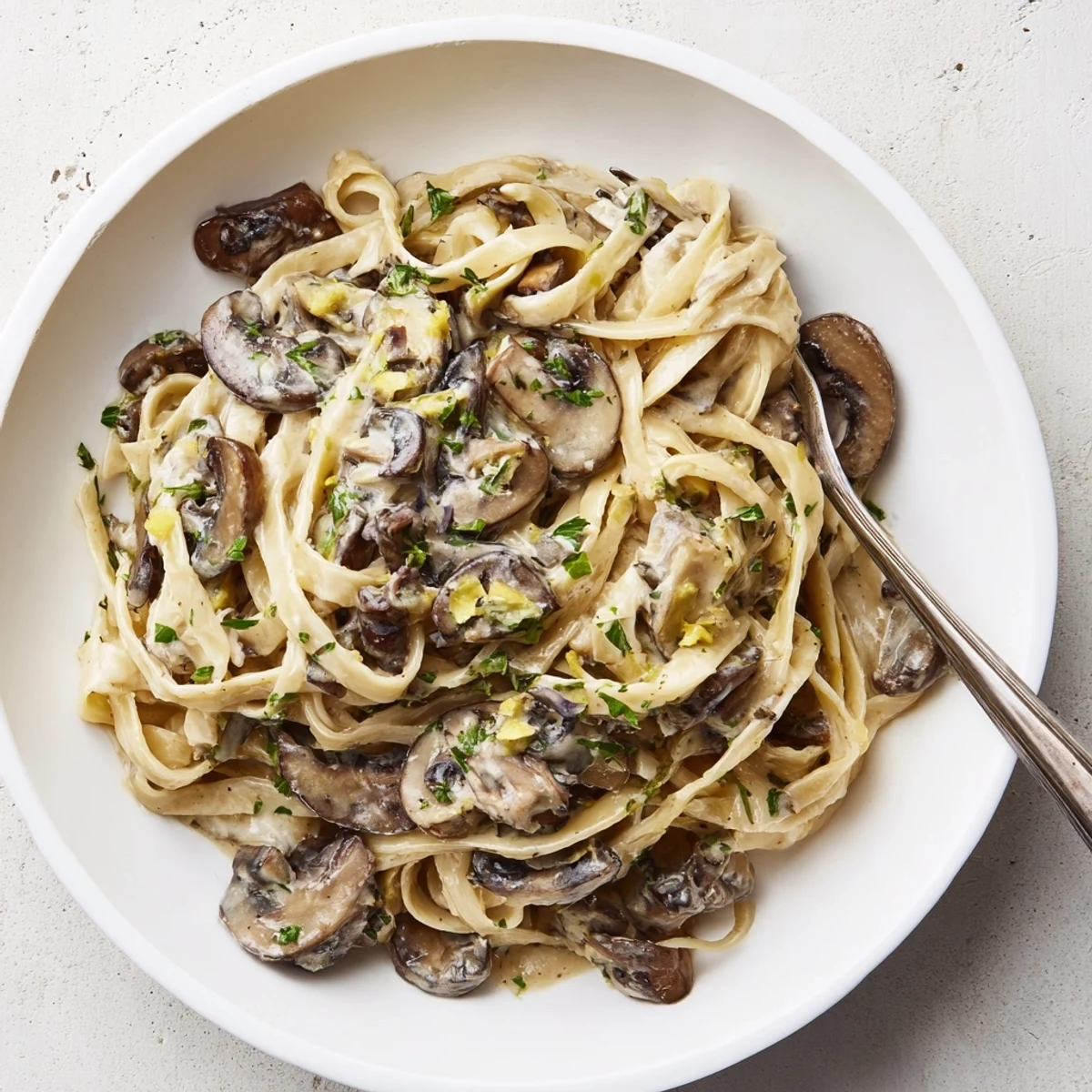 Creamy One-Pot Mushroom Pasta simmered to perfection, rich with parmesan and herbs.  