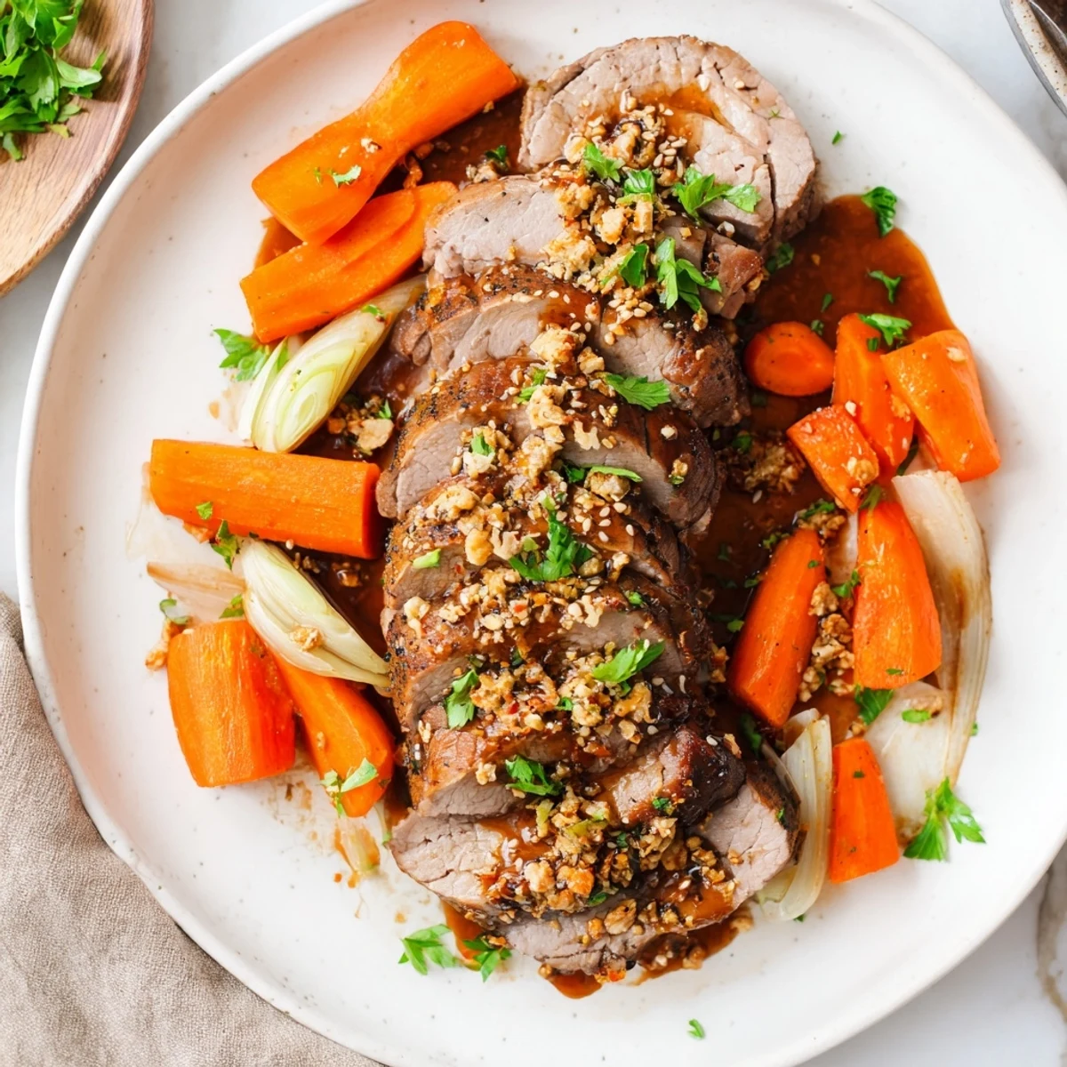 Aromatic honey garlic pork roast simmering to perfection in a slow cooker.  
