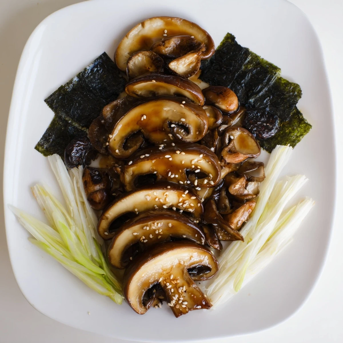 Beautiful Umami Bomb Asian Delight appetizer board arranged with mushrooms, seaweed, and pickled flavors.