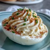 Perfectly piped Classic Deviled Eggs, a delicious crowd-pleasing appetizer for any festivity.
