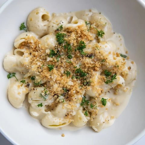 Golden, bubbly Truffle Macaroni & Cheese, a rich and comforting main dish, ready to savor.