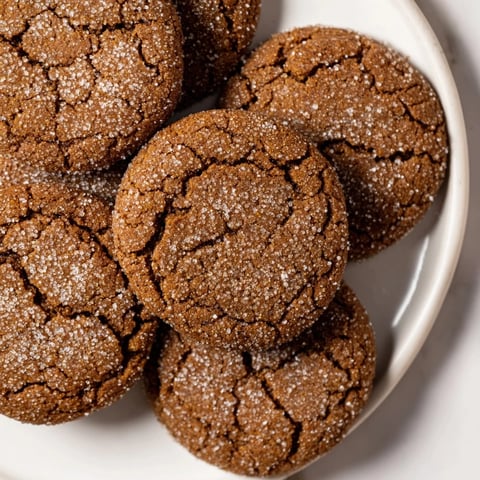 Warm, spiced Express Gingerbread Latte Cookies, beautifully crackled and ready to be enjoyed with a hot drink.
