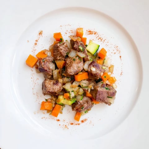 Tender Sweet Lamb Platter for Baby's Party, served with colorful cooked vegetables, steaming gently.