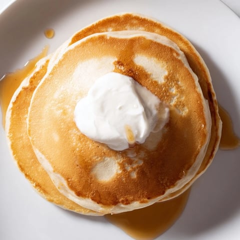 Golden, stacked protein banana pancakes, ready to devour, a satisfying and easy breakfast.