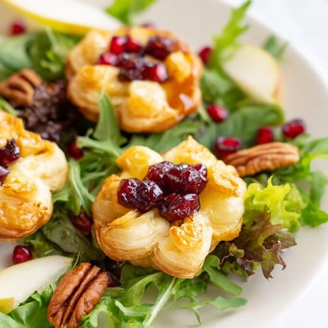 Close-up of baked cranberry and brie flower bites with puff pastry, so delicious!