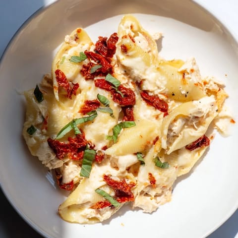 Creamy, golden-baked Marry Me Chicken Stuffed Shells, perfect for a cozy, delicious family dinner.