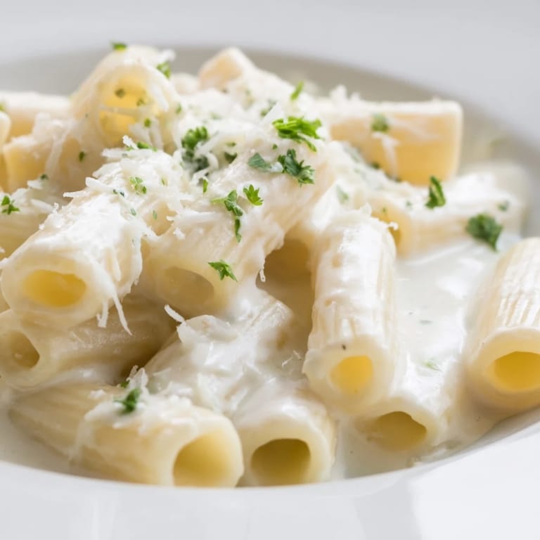 Creamy Milk Pasta One-Pot simmered in milk, showing a thick, velvety sauce clinging to penne.