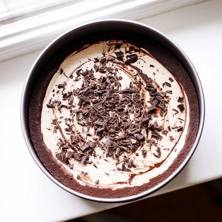 Decadent healthier chocolate cheesecake, smooth and creamy, perfect for dessert.