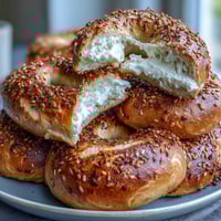 High-protein cottage cheese bagels with a golden crust, perfect for a quick breakfast or snack on the go.
